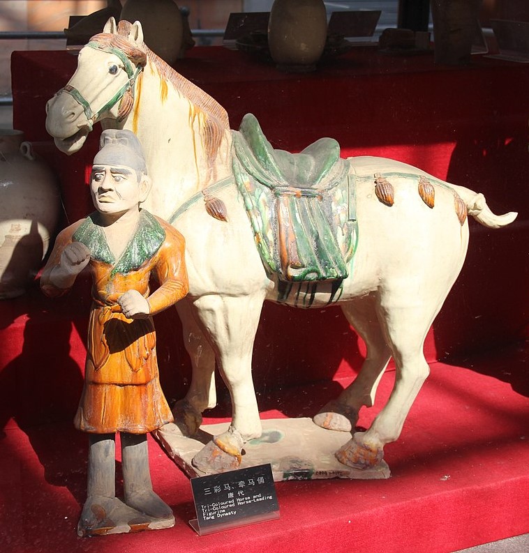 1200px-Grave_Offerings_5_-_Tang_Sancai_Porcelain_Horse_&_Attendant.jpg