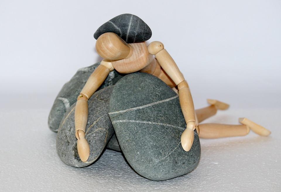 wooden-figure-stone.jpg