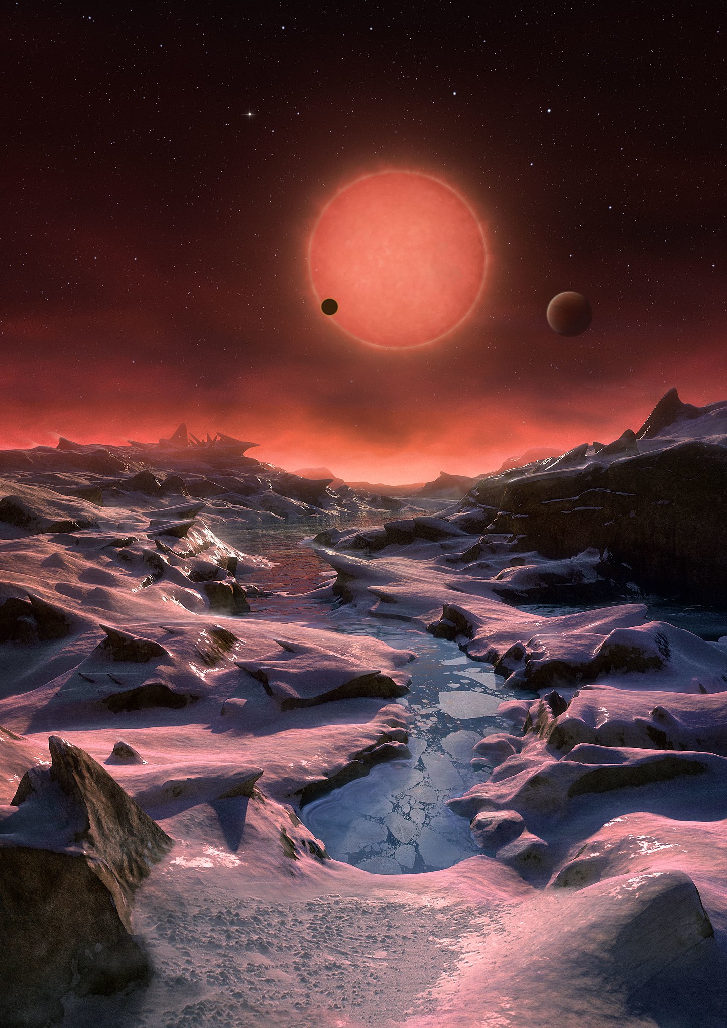 Artist’s_impression_of_the_ultracool_dwarf_star_TRAPPIST-1_from_the_surface_of_one_of_its_planets.jpg