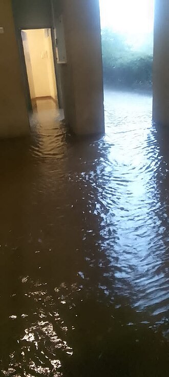 Building_Flooded_Due_to_Heavy_Rainfall.jpg
